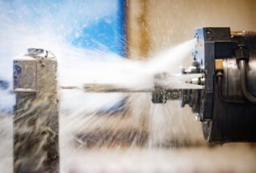 Machine tool in metal factory with drilling modern cnc machines