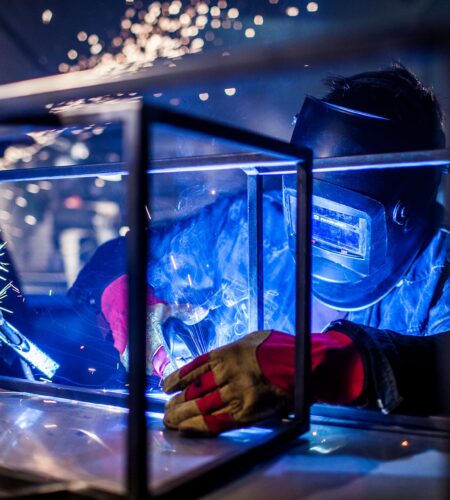 man welds at the factory. High quality photo